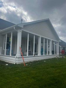 White vinyl posts installed to accept three season room windows