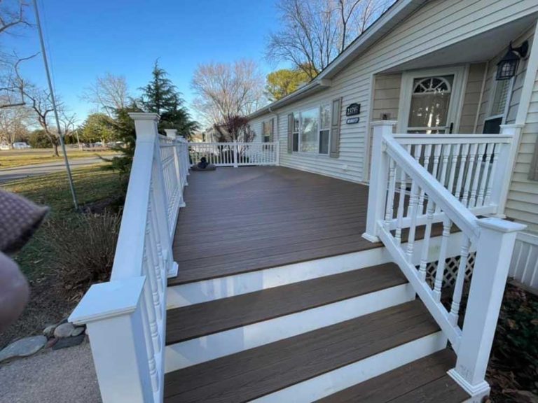 Front porch with white vinyl rail