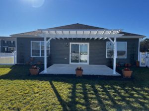 White pergola over patio