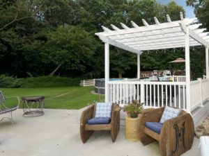 Alternate view of white pergola over top of deck