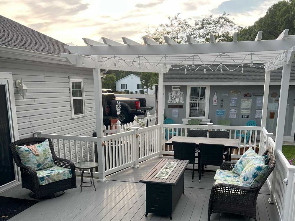 White pergola over top deck