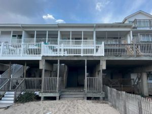 White vinyl rail on beach house